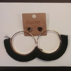 Brand new gold hoop earrings with black tassle